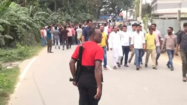 মন্ত্রীর মিছিলে প্রদর্শন করা সেই অস্ত্রের লাইসেন্স বাতিলের সুপারিশ