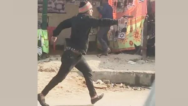 প্রকাশ্যে পিস্তল উঁচিয়ে গুলি করা কে এই যুবক