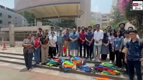 এনএসইউ’র আইন বিভাগের উদ্যোগে রিকশাচালকদের মাঝে ছাতা বিতরণ