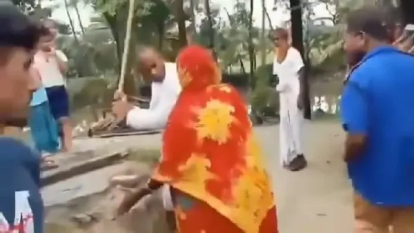 ছেলের অপরাধে মাকে লাঠিপেটা করলেন ইউপি সদস্য