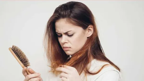 চুল পড়া রোধ করবেন যেভাবে