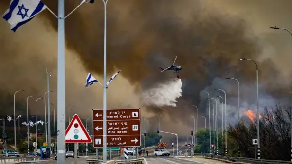 ভয়াবহ দাবানলে পুড়ছে ইসরায়েল, পালাচ্ছে মানুষ