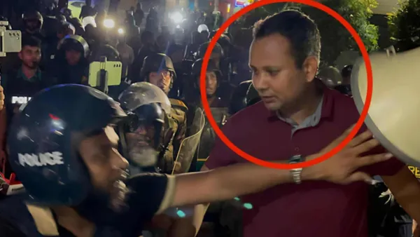 মেরুন পোলো শার্ট পরা সেই ব্যক্তি পল্টন থানার ওসির ড্রাইভার