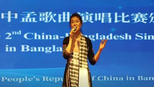 মাইলসের ‘নীলা’ গান গেয়ে স্বর্ণ জিতলেন চীনা তরুণী